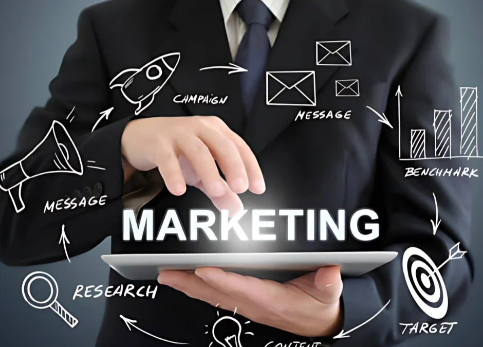 Businessman holding tablet with marketing strategy icons.